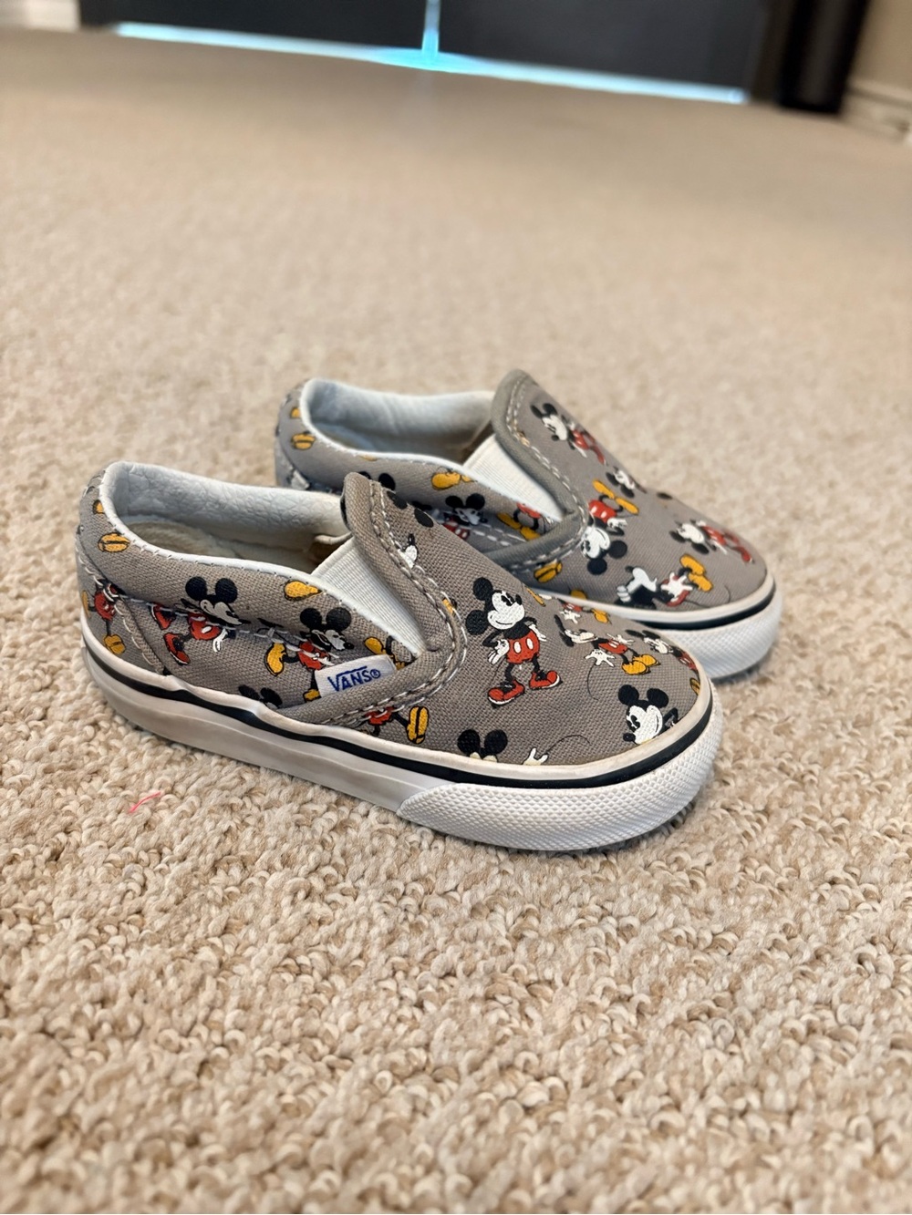 Vans Kids' Gray Mickey Mouse Slip-On Sneakers with Red and Yellow Accents